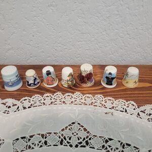 Lot of 7 Porcelain Thimbles Assorted places London Palm Springs San Diego Delft